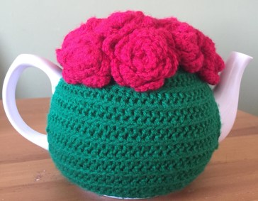 Crochet rose tea cosy