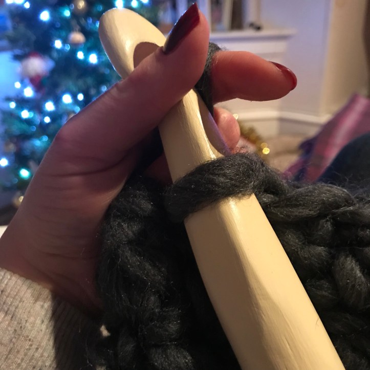 Crochet hook and ultra super chunky yarn 