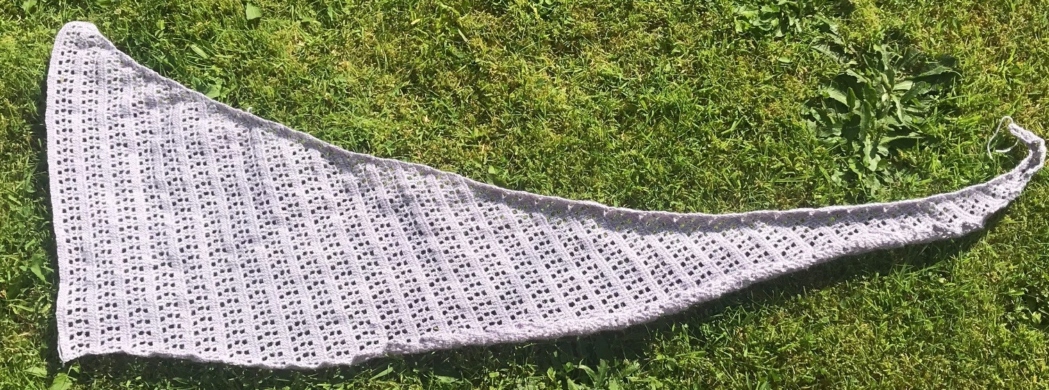 Crochet shawl before blocking