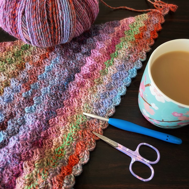 corner to corner crochet blanket sitting on a table